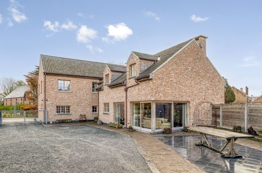 Woning met loods te koop in MERCHTEM