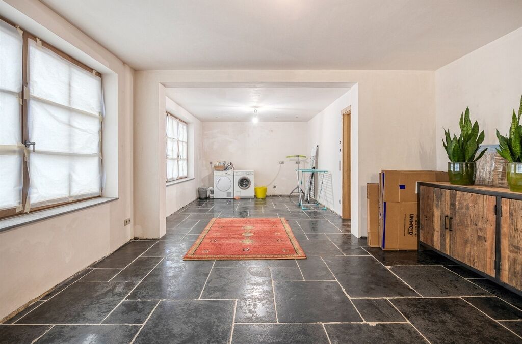 Woning met loods te koop in MERCHTEM