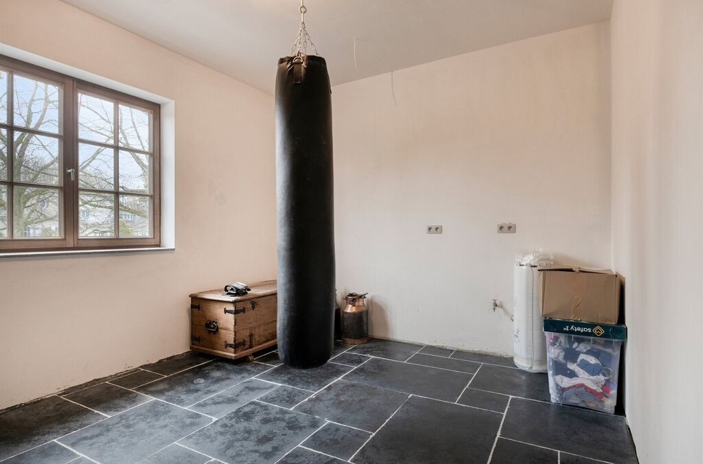 Woning met loods te koop in MERCHTEM