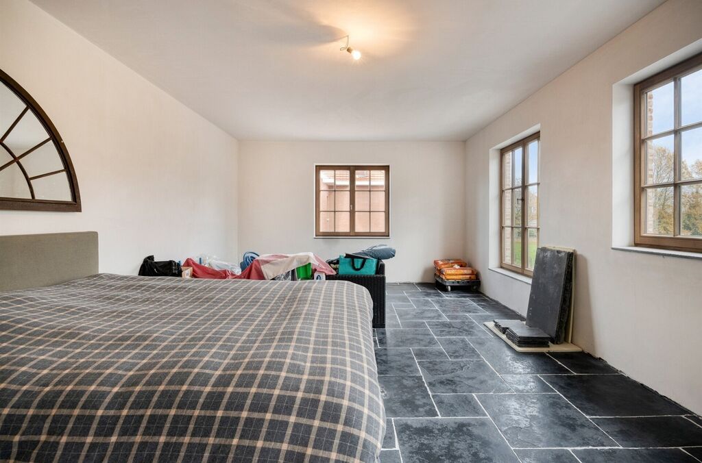 Woning met loods te koop in MERCHTEM