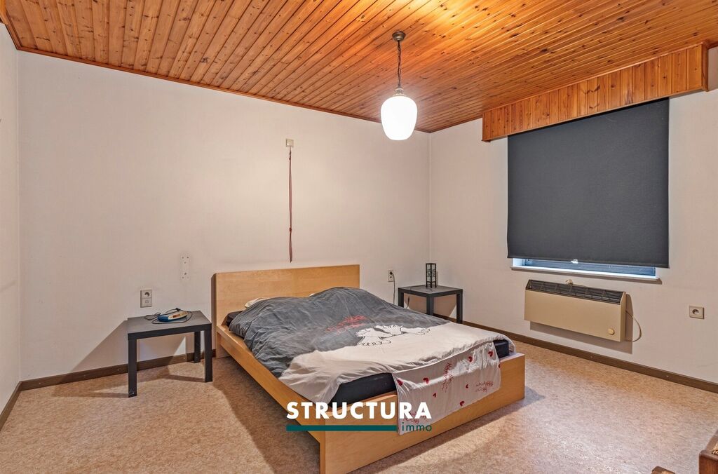 Woning met loods te koop in MERCHTEM